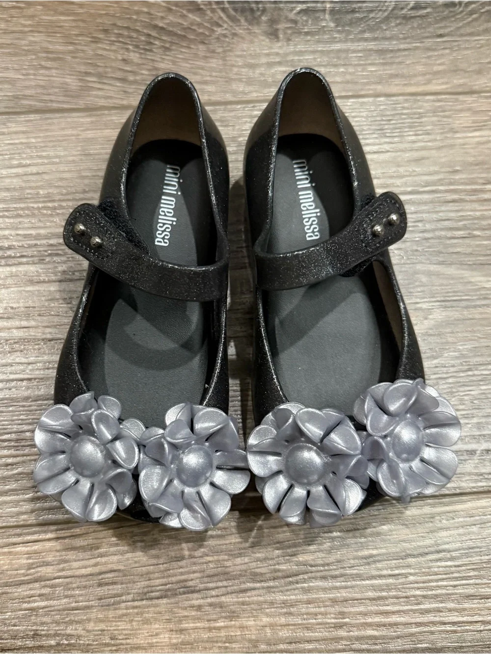 Mini Melissa Girls Black Mary Jane Flats with Silver Flower Accents